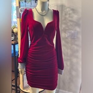 Classy and sassy red velvet with rhinestones stones on sleeves dresss.